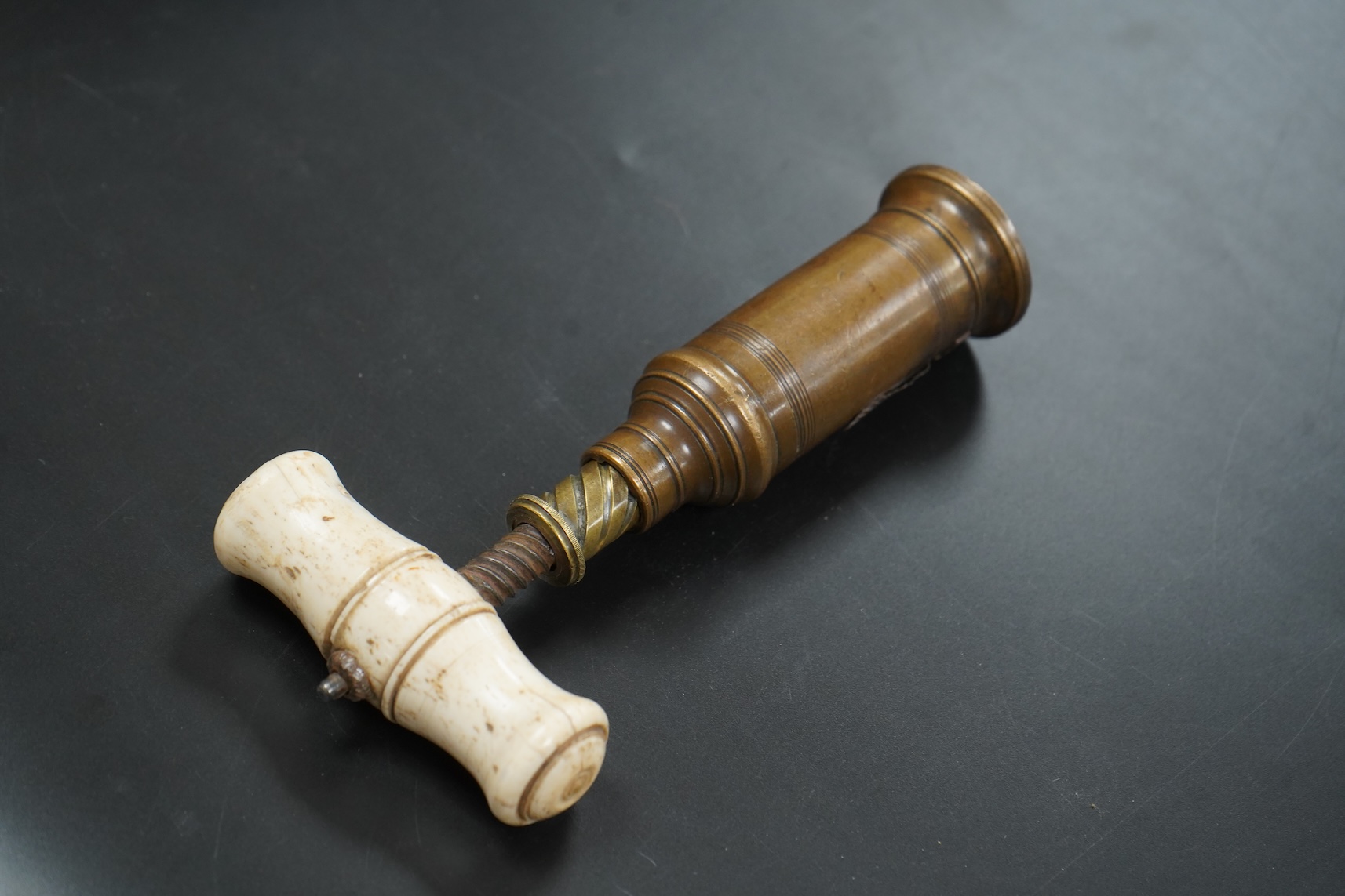 A 19th century Thomason type corkscrew with bone handle